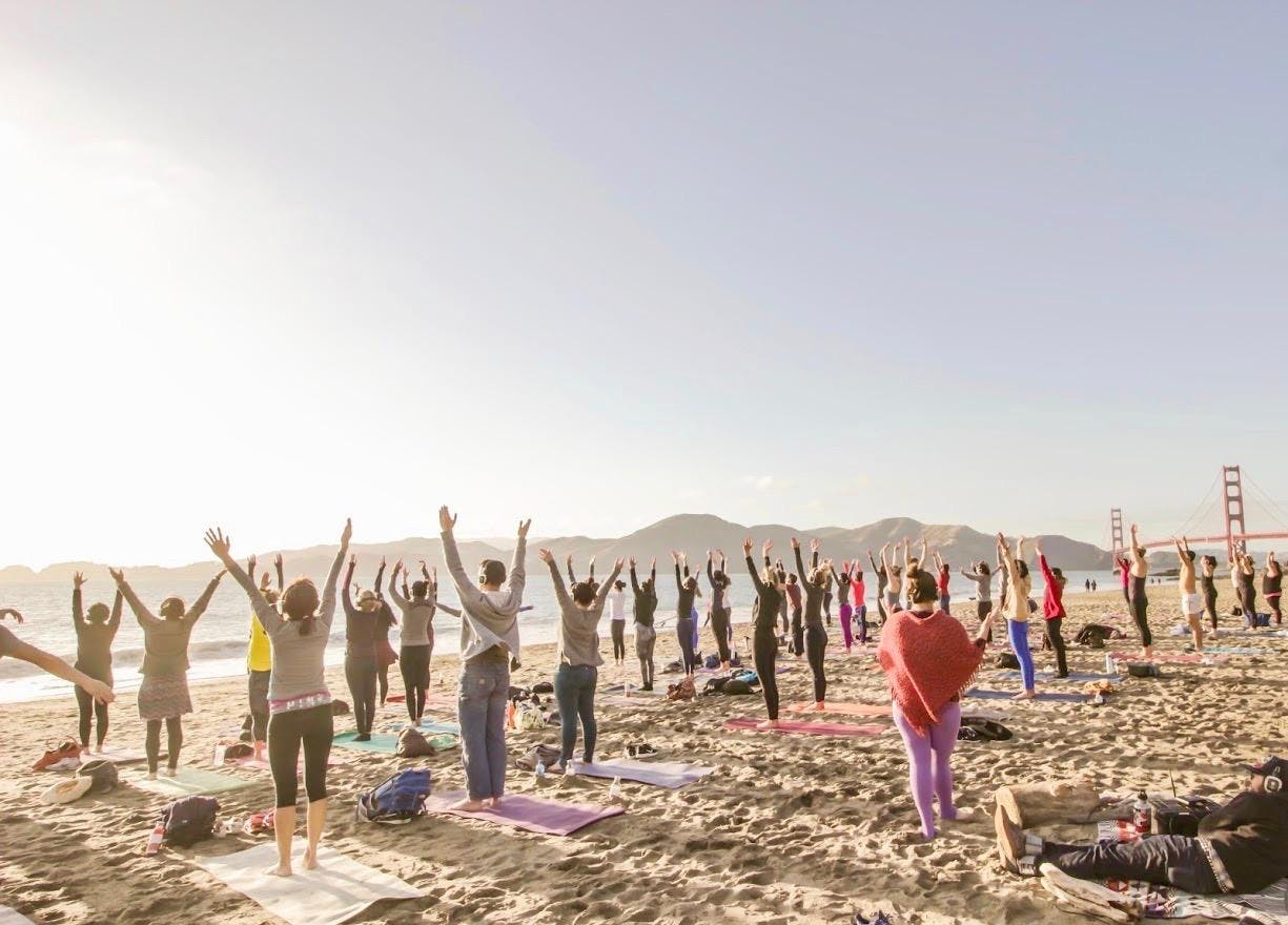 Saturday Groove: Silent Disco Beach Yoga with Sarah Allison!