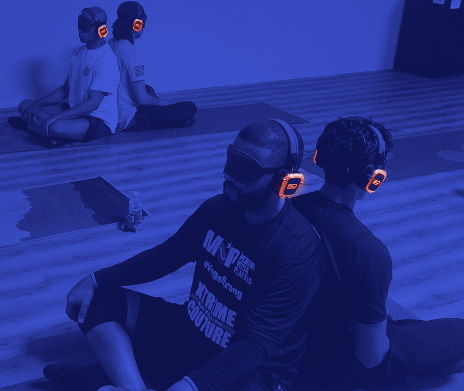 Student meditating with silent disco headphones