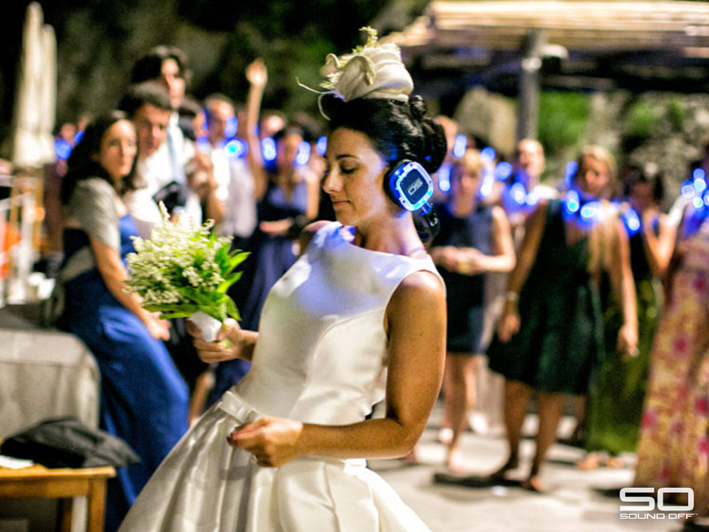 Bride wearing Sound Off headphones dancing at a silent disco wedding