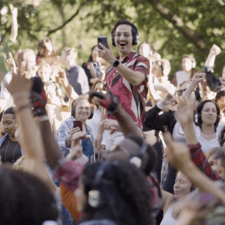 Crowd wearing Sound Off headphones at a Daybreaker event