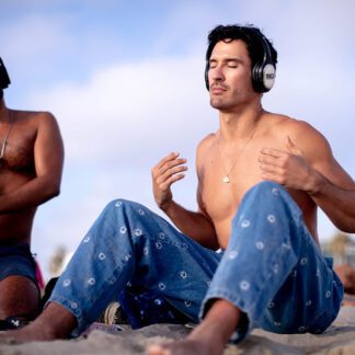 Beach meditation with silent disco headphones