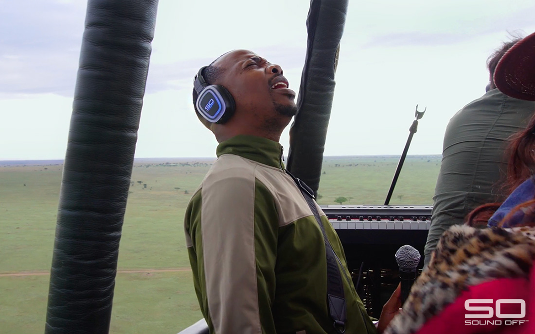 Man wearing silent disco headphones in hot air balloon